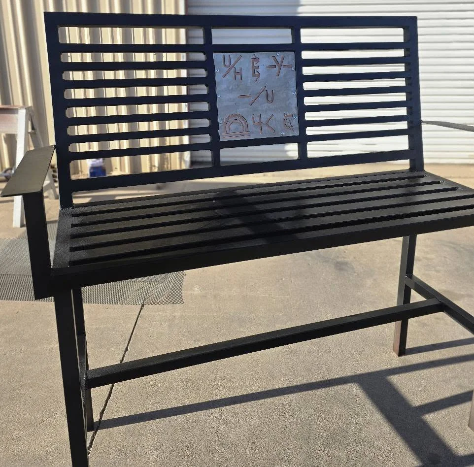 Finished steel bench with a custom-cut center panel