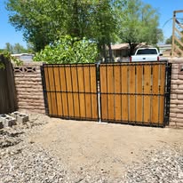 Custom wood and steel driveway gate